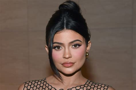 Kylie Jenner bares her thong in sheer dress 